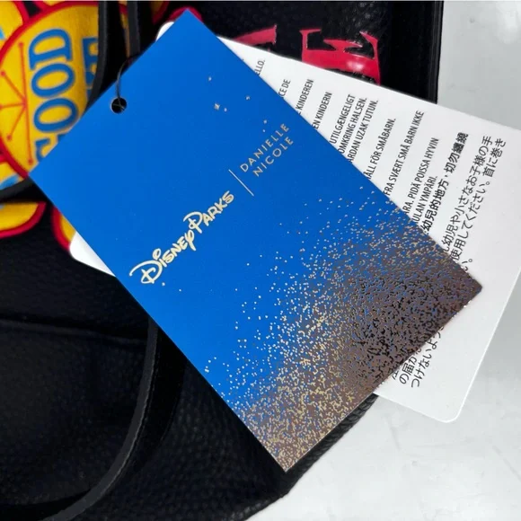 Danielle Nicole Disney It’s a Small World Black Tote with Colorful Patches - Picture 3 of 11